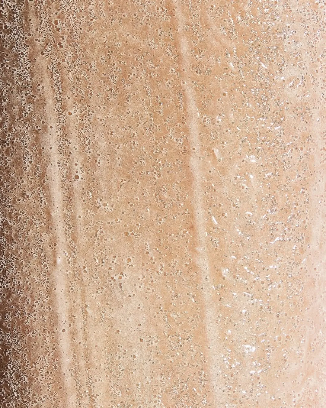 Textura orgánica ámbar con relieve fino.