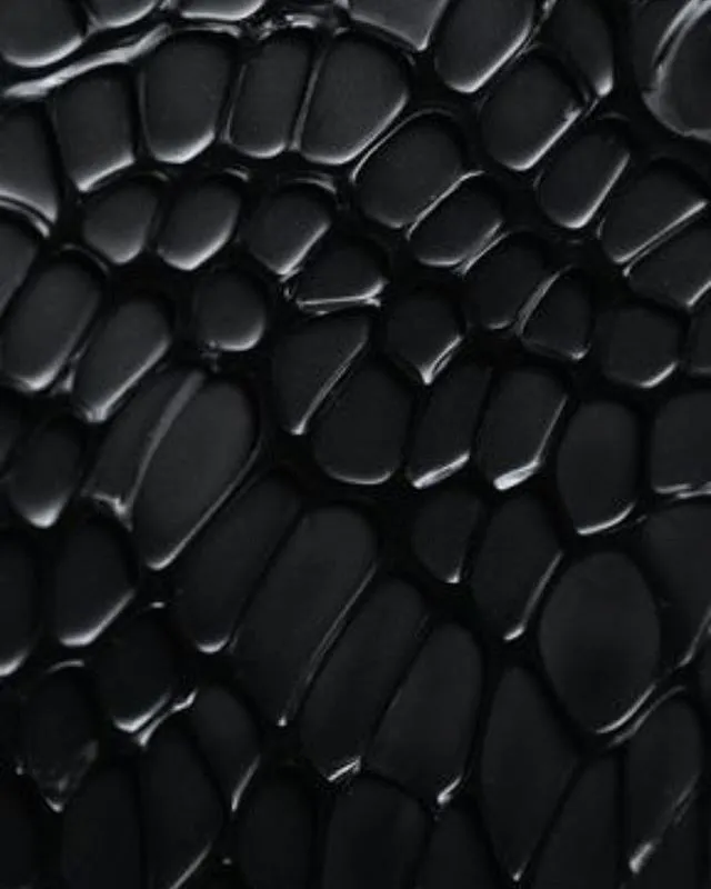 Textura de material polimérico negro brillante.